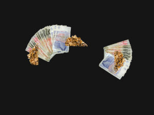 image of gold jewellery and cash