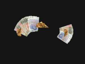 image of gold jewellery and cash