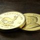 Krugerrand coins on a table - sell krugerrands