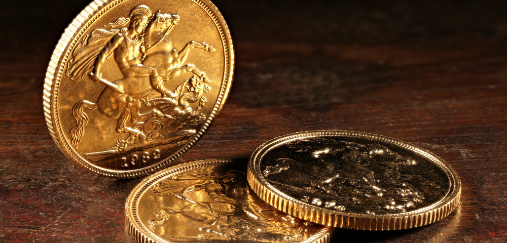 Three Gold Sovereigns on Table