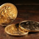 Three Gold Sovereigns on Table