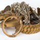 A variety of old jewellery which is broken and unused